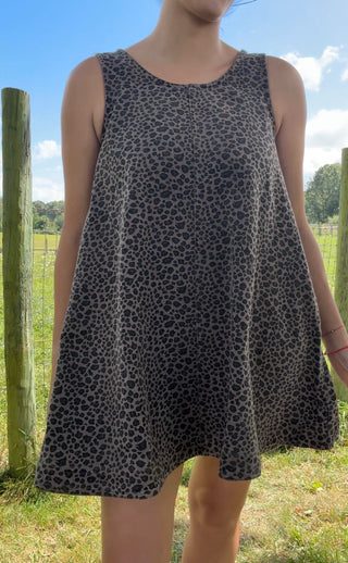 Charcoal gray sleeveless swing dress with subtle black leopard print and a relaxed, flowy silhouette.