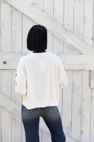 HALLOWEEN CREWNECK SWEATSHIRT BY MARYSQUARE SEQUIN DETAILING TRICK OR TREAT SWEATSHIR BACK VIEW IN WHITE