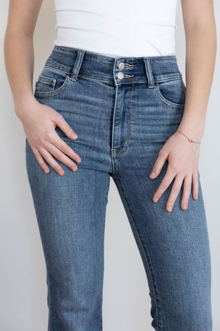 Flattering high-waisted flare jeans in stretch denim, perfect for effortless style and all-day comfort for busy, fashion-forward women