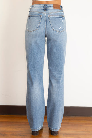 Judy Blue distressed high-waisted straight-leg jeans in vintage wash, featuring a ripped knee detail for an effortlessly edgy look back view with light distressing on back pockets