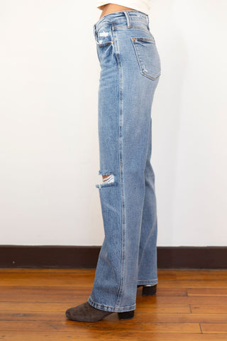 Judy Blue distressed high-waisted straight-leg jeans in vintage wash, featuring a ripped knee detail for an effortlessly edgy look
